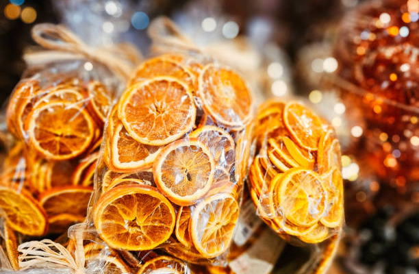 Step-by-step guide showing orange slices being dried in oven for decor